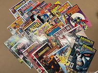 Overhead view of all comics spread in fan layout