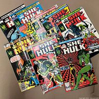 Group shot of all eight She-Hulk comics fanned out