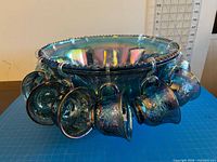 Top angled view of punch bowl with hanging cups