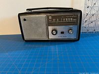 Front view of Viking portable radio showing tuner scale and speaker grille