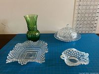 Group shot of all four glass pieces