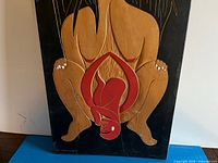 Mid section showing female torso and carved outlines