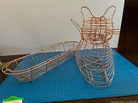 Both baskets side by side on mat