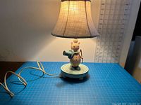 Front view cat lamp with shade on cutting mat