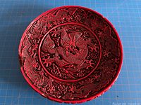 Top view showing full carved plate and damage