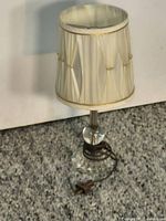 Full view of lamp showing shade, stem, base, and cord