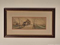 Full view of framed painting showing mat and frame