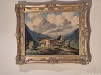 Front view of framed Alpine landscape painting