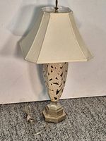 Full view of lamp with shade, base and cord visible