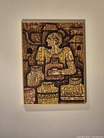 Full view of framed abstract painting on wall