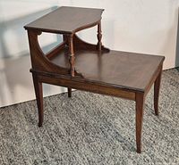 Full view of two-tier side table showing overall design and legs