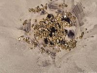 Close-up of flower centers with gold crushed glass accents