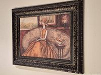 Full view of framed print on wall