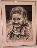 Full view of framed charcoal portrait