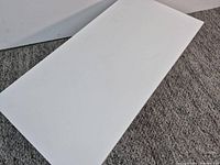 Top view of rectangular white table surface