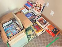 Box of mixed hardcover and softcover books plus magazines, including Mexico 68 volumes and assorted travel books