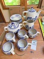 Full view of all stoneware pieces on table