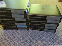 Full 12-volume set stacked in two columns