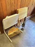 Group view of plastic tray, two wooden trays, brass coal scuttle and fireplace tools