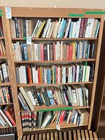 Front view of solid wood bookcase with shelves