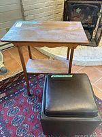 table and ottoman together, showing relative size and finishes