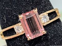 Front view of 10K gold ring with pink tourmaline and diamond accents