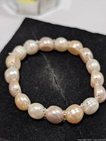 Entire bracelet showing pearls and stretch design