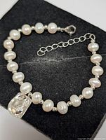 Full view of freshwater pearl bracelet on display pad