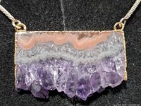 front view of agate/amethyst pendant on silver chain
