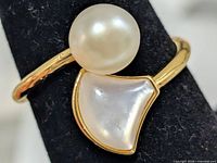 Front view showing mother-of-pearl and freshwater pearl on ring