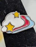 front view showing enamel cloud and stars