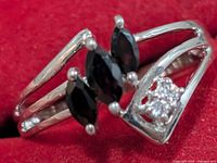 Front view showing garnets and clear stone cluster