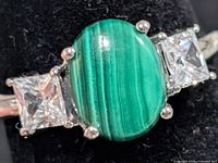 Top view showing malachite center stone and two CZ side stones