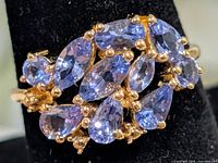 Top view of ring showing cluster of tanzanite stones