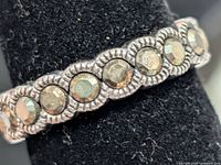 Close-up of marcasite stones and milgrain detail on silver band