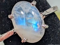 Front view showing oval moonstone and prongs