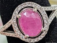 Front view showing ruby, CZ halo, split shank