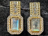 front view showing labradorite stones, CZ halo and bar detail