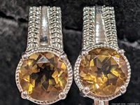 front view showing smoky quartz stones and silver detailing