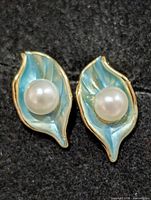 Front view of both earrings showing design