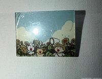 Front view of lucite brooch showing full illustration