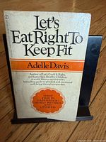 Front cover showing title, author, and first-time paperback seal