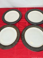 All four plates displayed