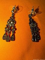 front view showing both earrings and overall design