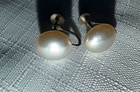 front view showing pearl faces and screw-back posts