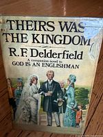 Front cover of hardcover with title, author and dust jacket wear visible