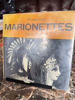 Front cover of Presenting Marionettes book with dust jacket.