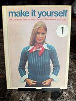 Front cover of hardcover book showing title, series and volume number