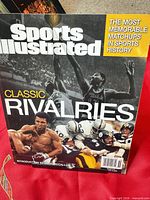 Front cover showing title, imagery of famous athletes