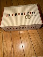Closed box top showing EL PRODUCTO branding and 50 Cigars text